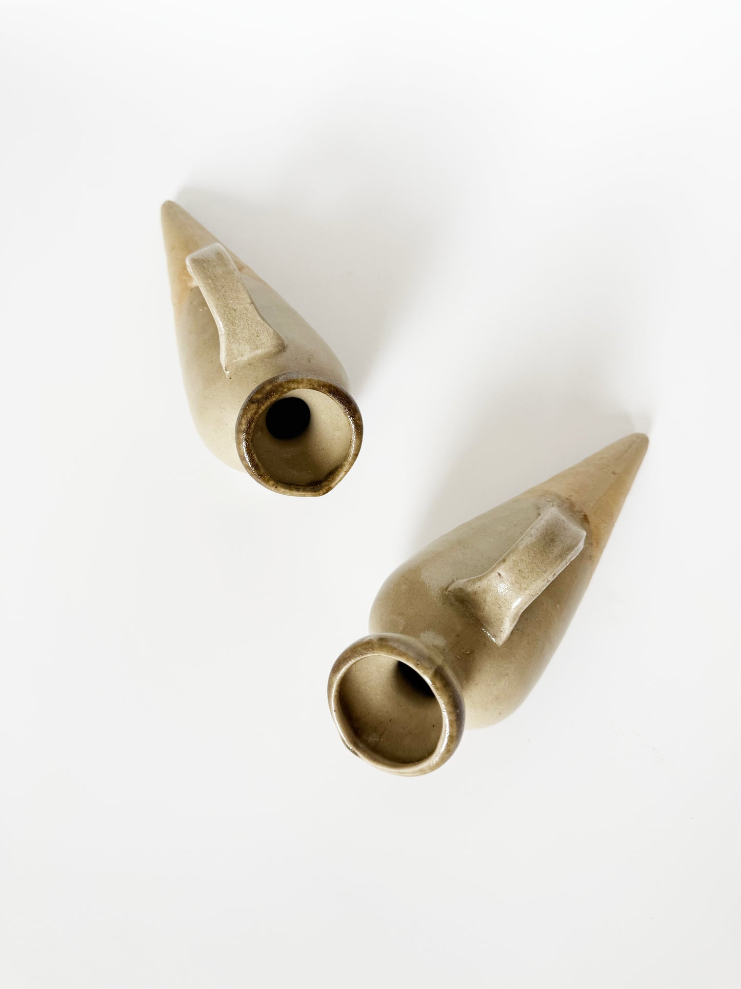 Pair of Pointed Ceramic Art Vessels